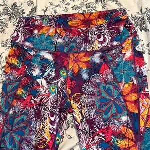 Beautiful patterned skirtsports running tights / leggings, size M